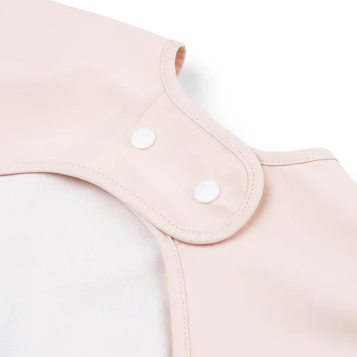 Babero grande con mangas y bolsillo Playground rosa 6-18 meses