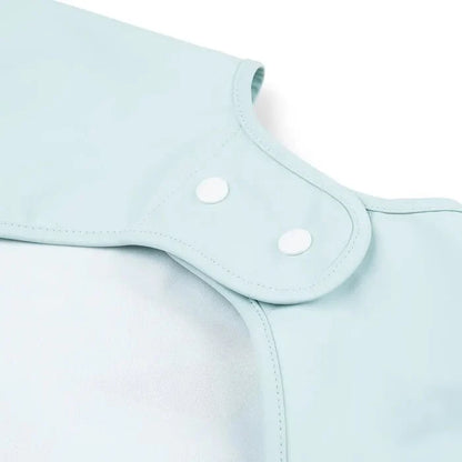 Babero grande con mangas y bolsillo Playground azul 6-18 meses